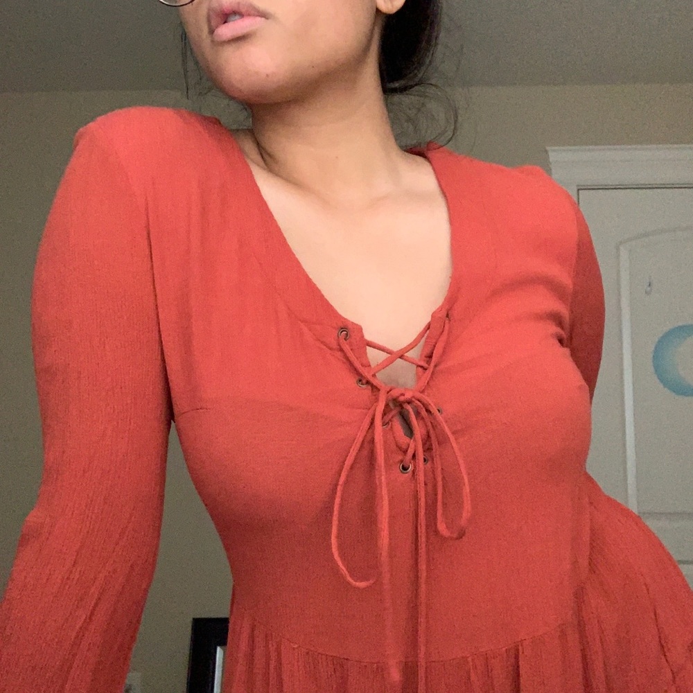 Rust/blood orange flowy 70’s style dress